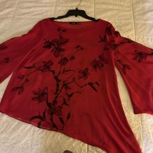 Beautiful asymmetrical cover blouse